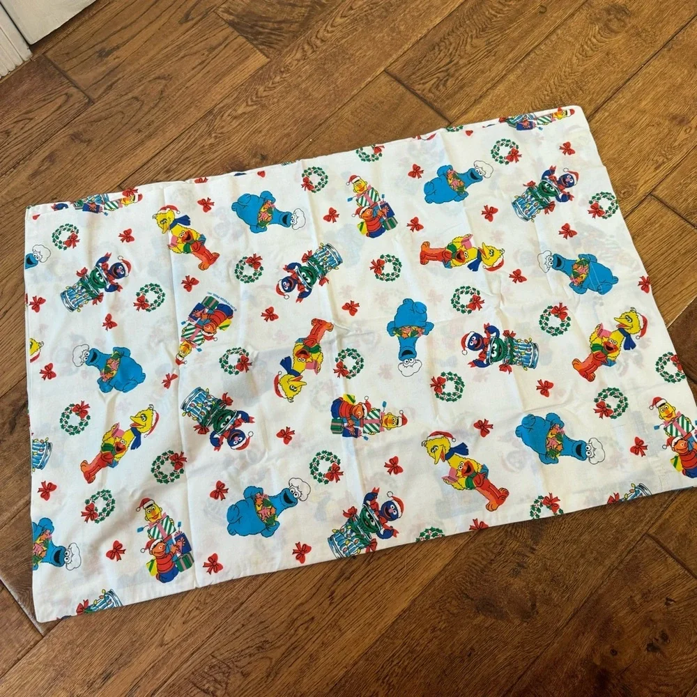 2 NEW Vintage Sesame Street Jim Henson Christmas pillowcases - standard size
